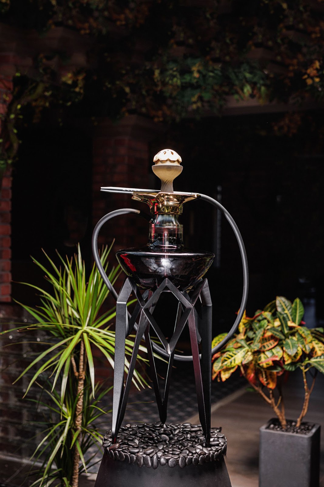 shisha setup with dark glass base and stylish stand