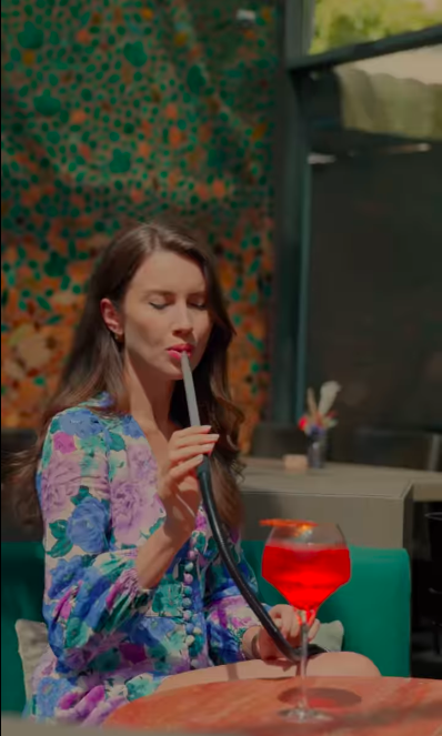 Girl enjoying shisha with drink at Savour Restaurant