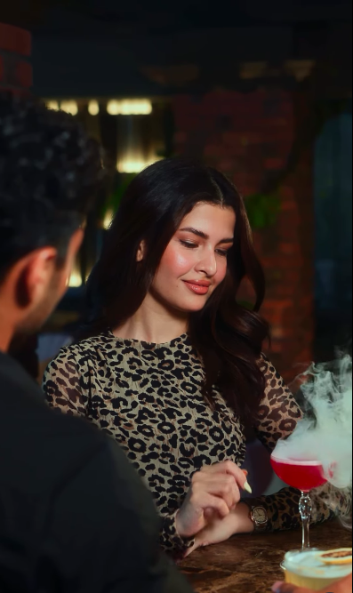 Couple enjoying a dinner date at Savour