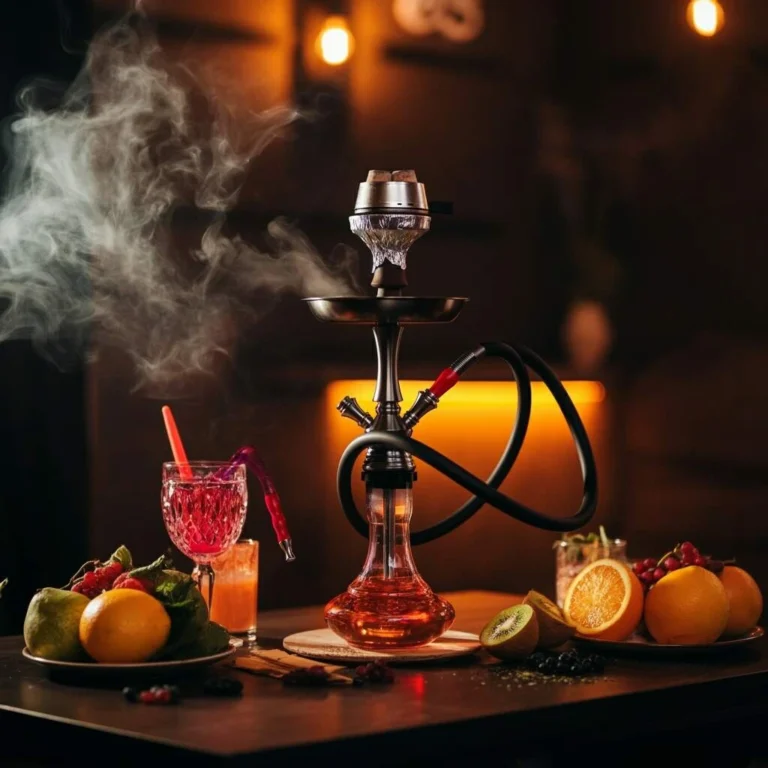 Luxury shisha setup with smoke rising beside fresh fruit platters and colorful mocktails in a warm, ambient lounge at Savour, Dubai.